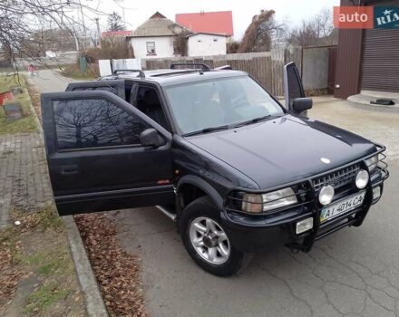 Черный Опель Фронтера, объемом двигателя 2.2 л и пробегом 329 тыс. км за 4999 $, фото 1 на Automoto.ua