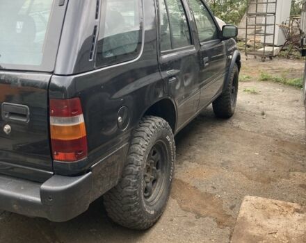 Черный Опель Фронтера, объемом двигателя 2.8 л и пробегом 300 тыс. км за 4500 $, фото 1 на Automoto.ua