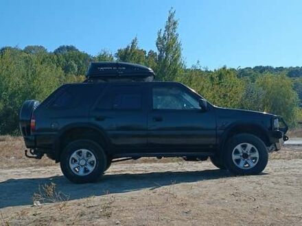 Черный Опель Фронтера, объемом двигателя 2.2 л и пробегом 284 тыс. км за 5800 $, фото 1 на Automoto.ua