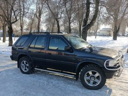 Черный Опель Фронтера, объемом двигателя 2.5 л и пробегом 161 тыс. км за 8999 $, фото 1 на Automoto.ua