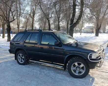Черный Опель Фронтера, объемом двигателя 2.5 л и пробегом 161 тыс. км за 8999 $, фото 1 на Automoto.ua