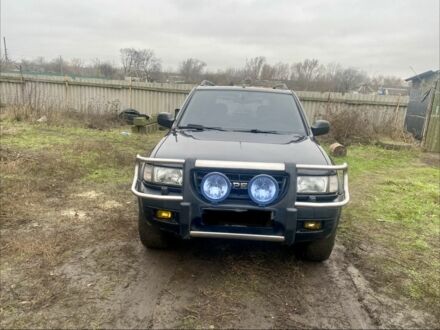 Черный Опель Фронтера, объемом двигателя 2.2 л и пробегом 300 тыс. км за 4100 $, фото 1 на Automoto.ua