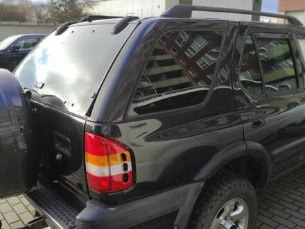 Черный Опель Фронтера, объемом двигателя 2.17 л и пробегом 306 тыс. км за 5500 $, фото 1 на Automoto.ua