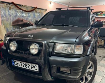 Чорний Опель Фронтера, об'ємом двигуна 2.2 л та пробігом 320 тис. км за 8000 $, фото 1 на Automoto.ua