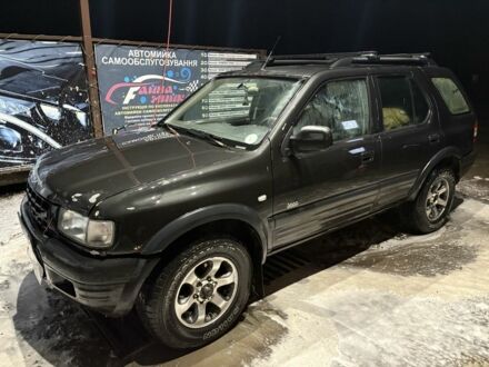 Черный Опель Фронтера, объемом двигателя 2.2 л и пробегом 358 тыс. км за 2500 $, фото 1 на Automoto.ua