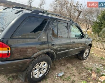 Черный Опель Фронтера, объемом двигателя 2.17 л и пробегом 350 тыс. км за 7100 $, фото 1 на Automoto.ua