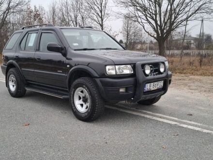 Черный Опель Фронтера, объемом двигателя 2.2 л и пробегом 290 тыс. км за 2100 $, фото 1 на Automoto.ua