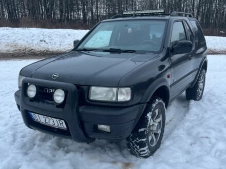 Черный Опель Фронтера, объемом двигателя 2.2 л и пробегом 237 тыс. км за 2200 $, фото 1 на Automoto.ua