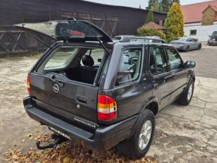 Черный Опель Фронтера, объемом двигателя 2.2 л и пробегом 260 тыс. км за 2400 $, фото 1 на Automoto.ua