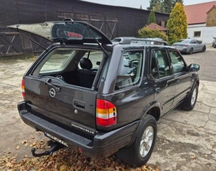 Черный Опель Фронтера, объемом двигателя 2.2 л и пробегом 260 тыс. км за 2400 $, фото 1 на Automoto.ua