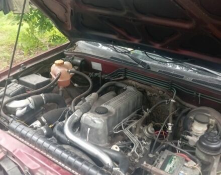 Красный Опель Фронтера, объемом двигателя 0 л и пробегом 336 тыс. км за 1785 $, фото 4 на Automoto.ua