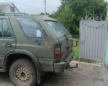 Красный Опель Фронтера, объемом двигателя 2.8 л и пробегом 450 тыс. км за 1432 $, фото 3 на Automoto.ua