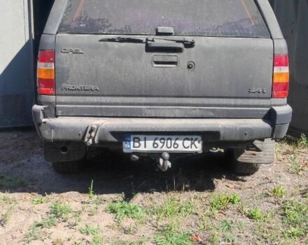 Червоний Опель Фронтера, об'ємом двигуна 2.4 л та пробігом 160 тис. км за 1448 $, фото 1 на Automoto.ua