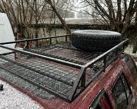 Красный Опель Фронтера, объемом двигателя 2.3 л и пробегом 285 тыс. км за 1150 $, фото 7 на Automoto.ua