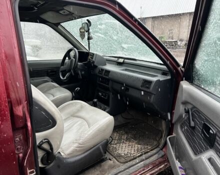 Красный Опель Фронтера, объемом двигателя 2.3 л и пробегом 285 тыс. км за 1150 $, фото 5 на Automoto.ua
