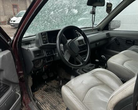 Красный Опель Фронтера, объемом двигателя 2.3 л и пробегом 285 тыс. км за 1150 $, фото 6 на Automoto.ua