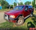 Красный Опель Фронтера, объемом двигателя 2.2 л и пробегом 300 тыс. км за 3700 $, фото 1 на Automoto.ua