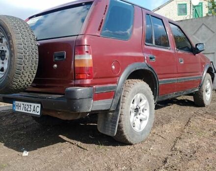 Красный Опель Фронтера, объемом двигателя 2.2 л и пробегом 280 тыс. км за 3370 $, фото 2 на Automoto.ua
