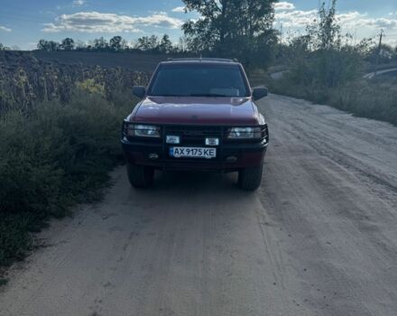 Красный Опель Фронтера, объемом двигателя 2 л и пробегом 400 тыс. км за 3300 $, фото 1 на Automoto.ua