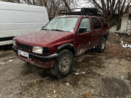 Красный Опель Фронтера, объемом двигателя 2.3 л и пробегом 285 тыс. км за 1150 $, фото 1 на Automoto.ua