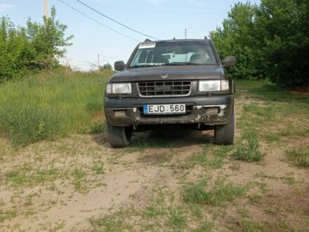 Опель Фронтера 2000 в Славянске на Automoto.ua Красный Опель Фронтера, объемом двигателя 2.2 л и пробегом 362 тыс. км за 3000 $, фото 1 на Automoto.ua