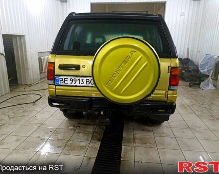 Желтый Опель Фронтера, объемом двигателя 2.5 л и пробегом 295 тыс. км за 2000 $, фото 3 на Automoto.ua