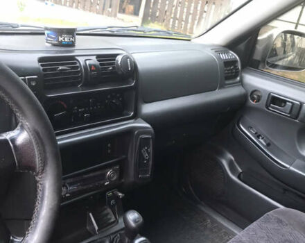 Серый Опель Фронтера, объемом двигателя 2.2 л и пробегом 370 тыс. км за 2000 $, фото 12 на Automoto.ua