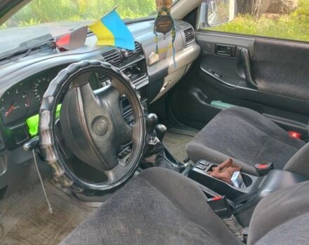 Серый Опель Фронтера, объемом двигателя 2 л и пробегом 397 тыс. км за 3000 $, фото 1 на Automoto.ua