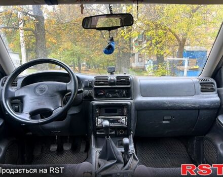 Серый Опель Фронтера, объемом двигателя 2.2 л и пробегом 200 тыс. км за 5800 $, фото 5 на Automoto.ua