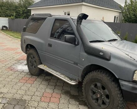 Серый Опель Фронтера, объемом двигателя 2 л и пробегом 200 тыс. км за 3931 $, фото 1 на Automoto.ua