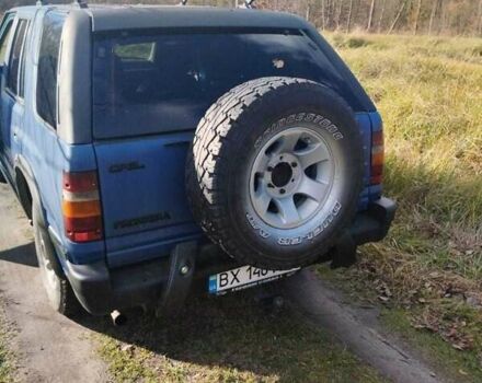 Синий Опель Фронтера, объемом двигателя 2.4 л и пробегом 290 тыс. км за 3500 $, фото 1 на Automoto.ua