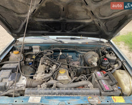 Синий Опель Фронтера, объемом двигателя 2.41 л и пробегом 354 тыс. км за 3500 $, фото 5 на Automoto.ua