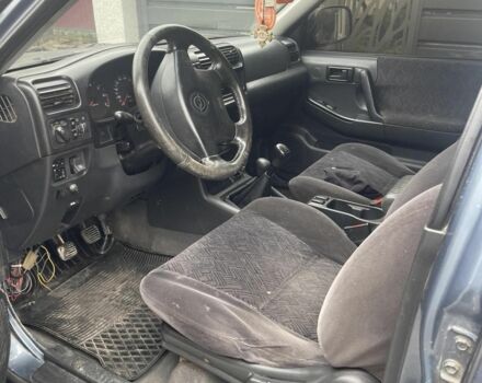 Синий Опель Фронтера, объемом двигателя 2.2 л и пробегом 280 тыс. км за 4300 $, фото 3 на Automoto.ua