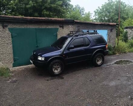 Синий Опель Фронтера, объемом двигателя 2.2 л и пробегом 176 тыс. км за 6000 $, фото 1 на Automoto.ua