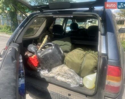 Синий Опель Фронтера, объемом двигателя 2.2 л и пробегом 330 тыс. км за 3500 $, фото 3 на Automoto.ua