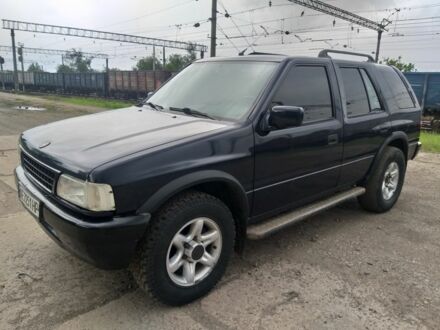 Синий Опель Фронтера, объемом двигателя 2.5 л и пробегом 250 тыс. км за 4200 $, фото 1 на Automoto.ua