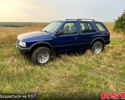 Синий Опель Фронтера, объемом двигателя 2.3 л и пробегом 300 тыс. км за 3000 $, фото 1 на Automoto.ua