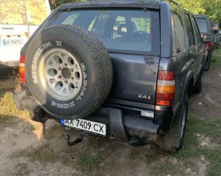 Синий Опель Фронтера, объемом двигателя 2.4 л и пробегом 250 тыс. км за 2495 $, фото 1 на Automoto.ua