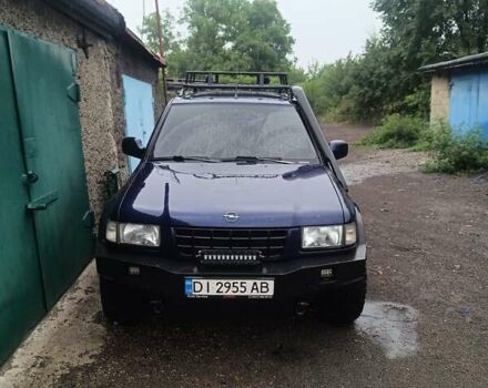 Синий Опель Фронтера, объемом двигателя 2.2 л и пробегом 176 тыс. км за 6000 $, фото 1 на Automoto.ua
