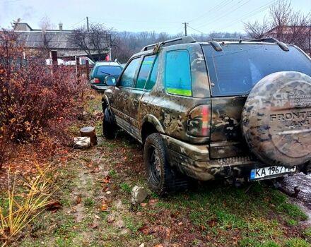 Зеленый Опель Фронтера, объемом двигателя 2.2 л и пробегом 250 тыс. км за 1500 $, фото 3 на Automoto.ua