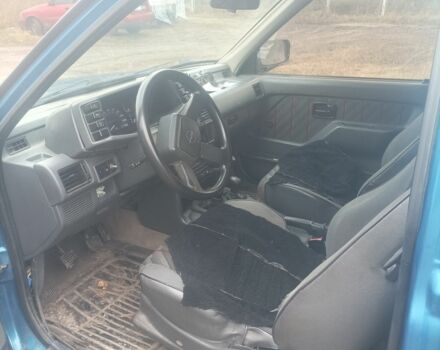 Зеленый Опель Фронтера, объемом двигателя 2 л и пробегом 280 тыс. км за 4100 $, фото 4 на Automoto.ua