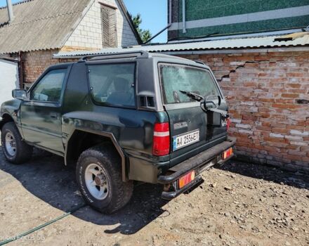 Зеленый Опель Фронтера, объемом двигателя 2 л и пробегом 25 тыс. км за 4000 $, фото 2 на Automoto.ua