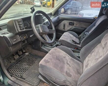 Зеленый Опель Фронтера, объемом двигателя 2.2 л и пробегом 213 тыс. км за 3000 $, фото 7 на Automoto.ua