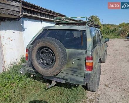 Зеленый Опель Фронтера, объемом двигателя 2.8 л и пробегом 200 тыс. км за 2300 $, фото 2 на Automoto.ua
