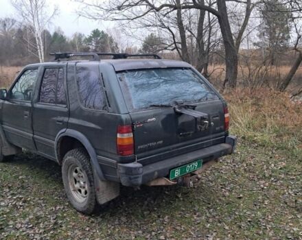 Зелений Опель Фронтера, об'ємом двигуна 2.3 л та пробігом 315 тис. км за 1899 $, фото 4 на Automoto.ua