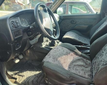 Зеленый Опель Фронтера, объемом двигателя 2.5 л и пробегом 238 тыс. км за 4800 $, фото 5 на Automoto.ua