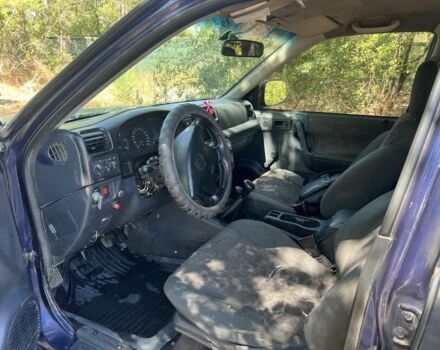 Зеленый Опель Фронтера, объемом двигателя 2.5 л и пробегом 100 тыс. км за 2000 $, фото 6 на Automoto.ua