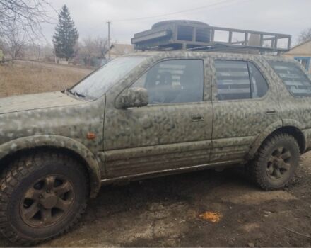 Зеленый Опель Фронтера, объемом двигателя 2.2 л и пробегом 200 тыс. км за 4000 $, фото 2 на Automoto.ua