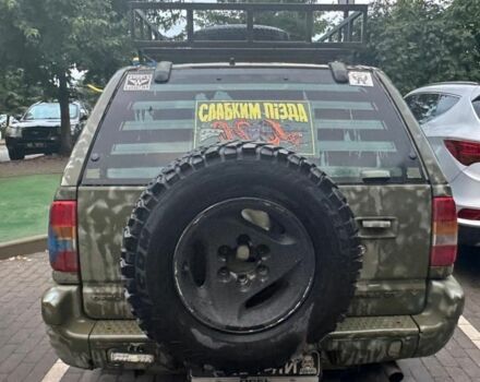 Зеленый Опель Фронтера, объемом двигателя 2.2 л и пробегом 202 тыс. км за 3500 $, фото 3 на Automoto.ua