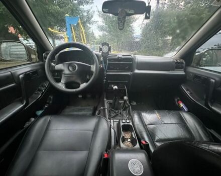 Зеленый Опель Фронтера, объемом двигателя 2.2 л и пробегом 202 тыс. км за 3500 $, фото 4 на Automoto.ua